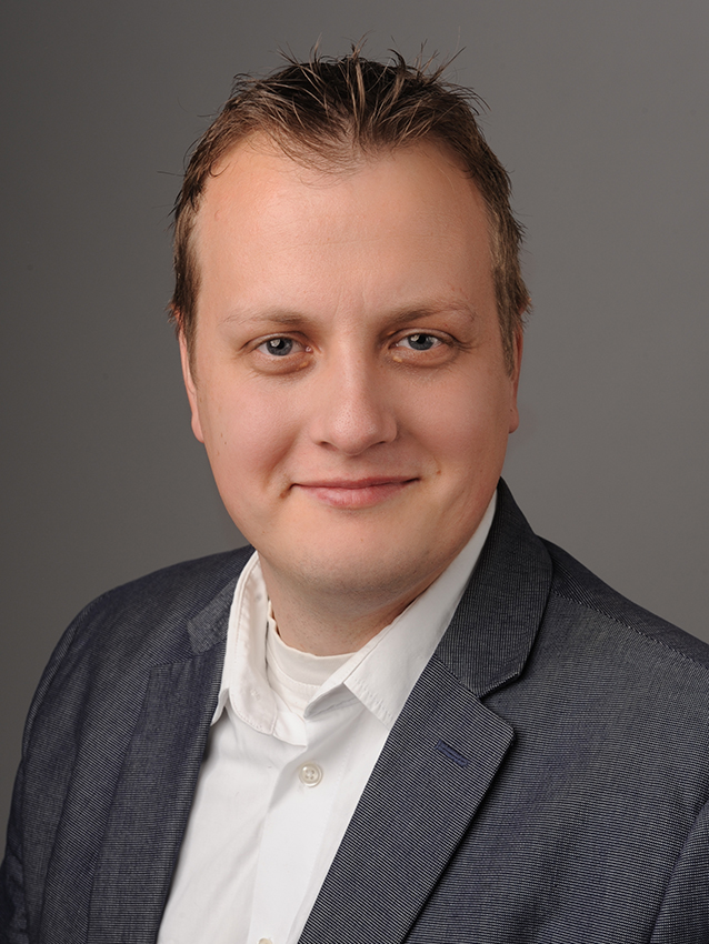 Foto von André Melzer, Head of Engineering bei Bike24 GmbH für eine Referenz über die Zusammenarbeit mit DevBoost.
