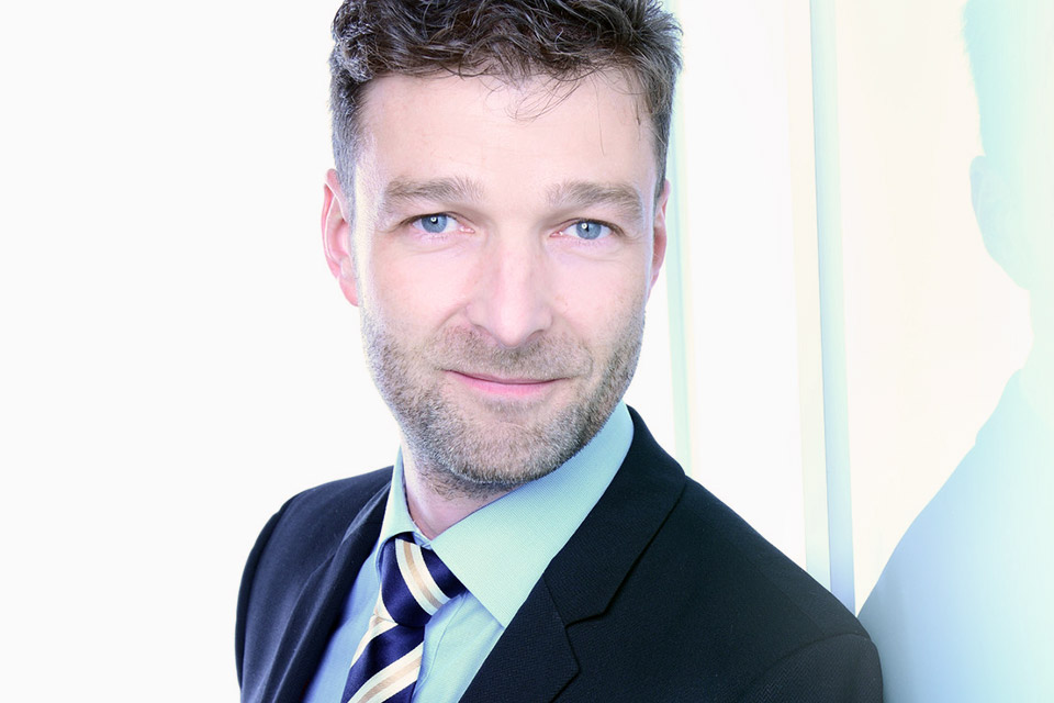 Foto von Uwe de Nardi, Director R&D bei JOYNEXT GmbH für eine Referenz über die Zusammenarbeit mit DevBoost.